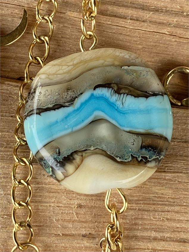 Démonstration du travail d’une fileuse de verre - Oui