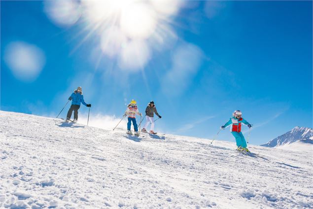 Ski tranquilles avec enfants sur une piste verte - Andy Parant