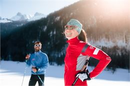 Couple de skieurs sur le domaine nordique des Aravis - C.Hudry